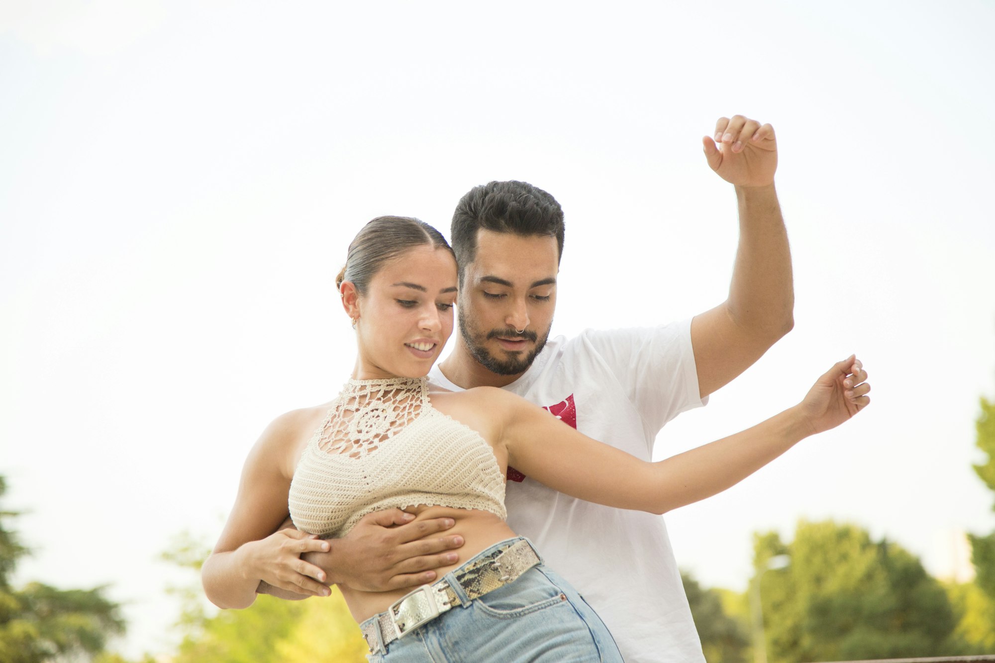 Couple dancing salsa in the street